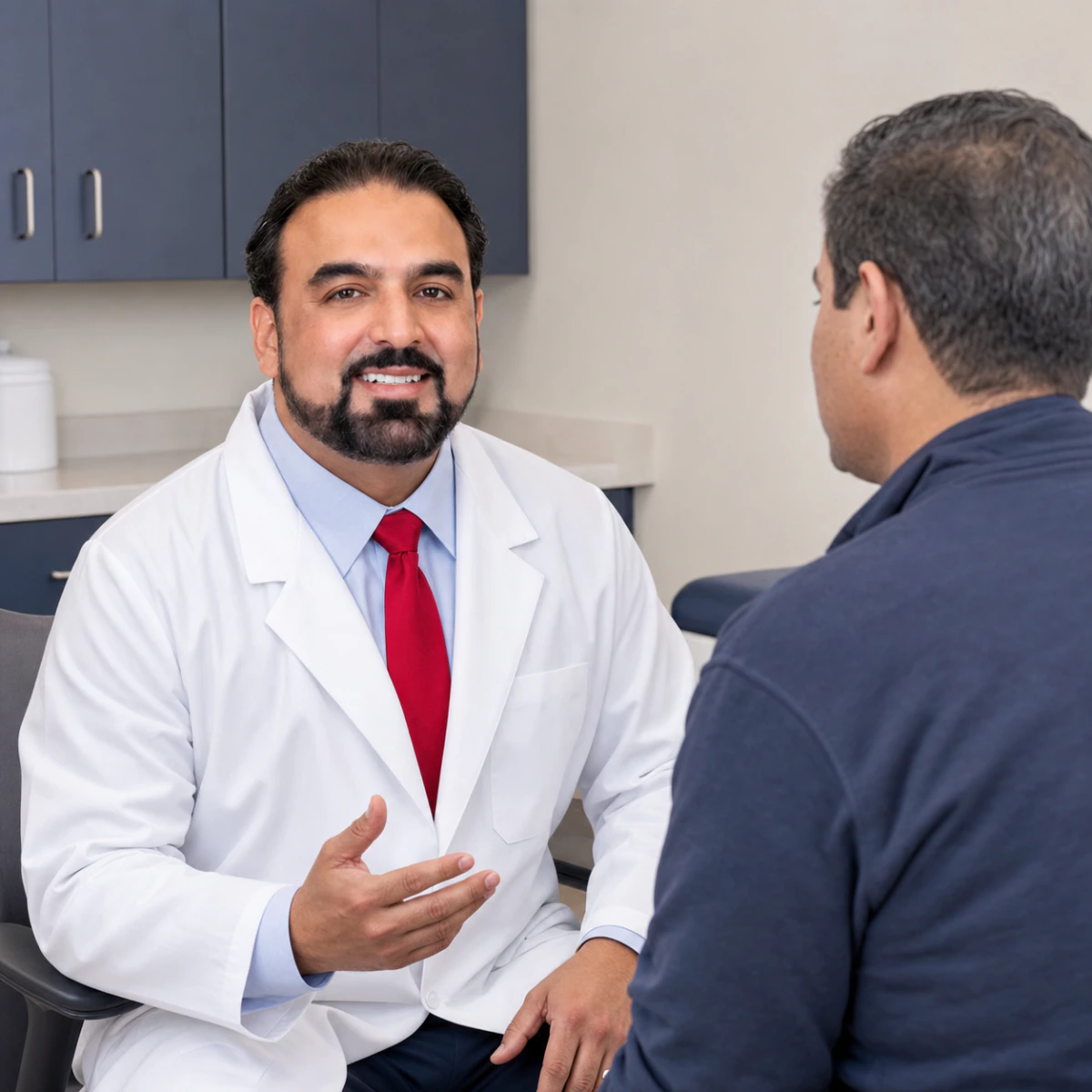 An InCare physician listening to a patient during a visit
